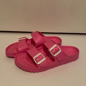 Pink Birkenstock Sandals with white buckles